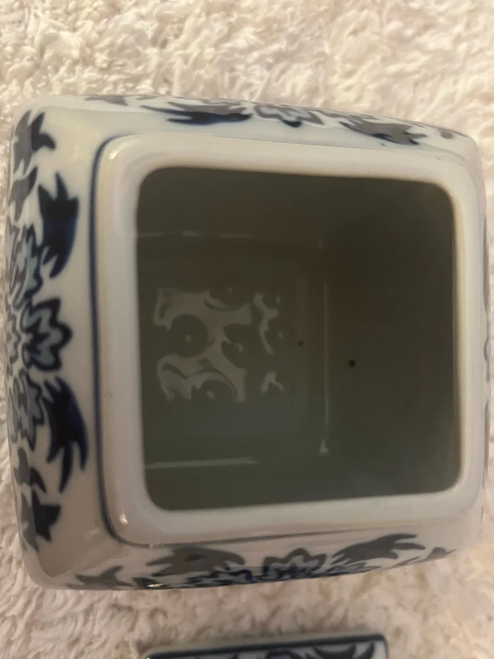 Vintage porcelain lidded blue and white floral jar